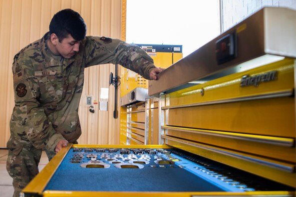 Airman 1st Class Rodney Keen, 20th Air Maintenance Unit CV-22 Osprey aircraft crew chief, opens a tool drawer at Cannon Air Force Base, N.M., Nov. 5, 2019. So far the kit has saved, on average, one hour per shift when it comes to checking out toolboxes and tools.  (U.S. Air Force photo by Senior Airman Gage Daniel)