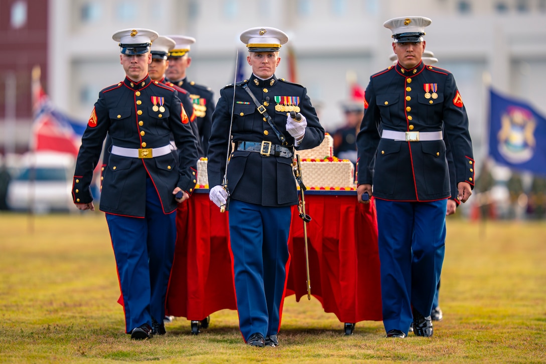 U.S. Marines and Sailors from Marine Corps Air Station Iwakuni, take part in the 244th Marine Corps birthday uniform pageant at Marine Corps Air Station Iwakuni, Japan, Nov. 4, 2019. The annual ceremony was held in honor of the 244th Marine Corps birthday. It included a historical uniform pageant to honor Marines of the past, present and future while signifying the passing of traditions from one generation to the next.