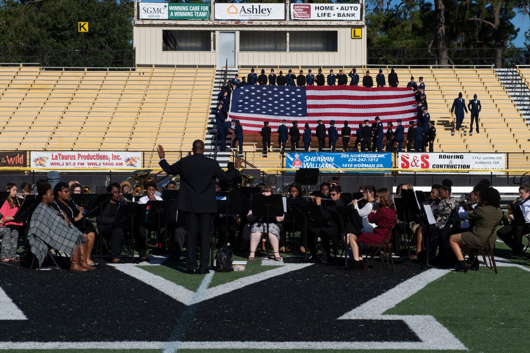 The Valdosta High School Band performs a selection of patriotic ballads at the American Legion Post 13 Veterans Day Observance Nov. 11, 2019, in Valdosta, Ga. This annual program honors veterans of the past and present for their service to the United States. (U.S. Air Force photo by 2nd Lt. Kaylin P. Hankerson)