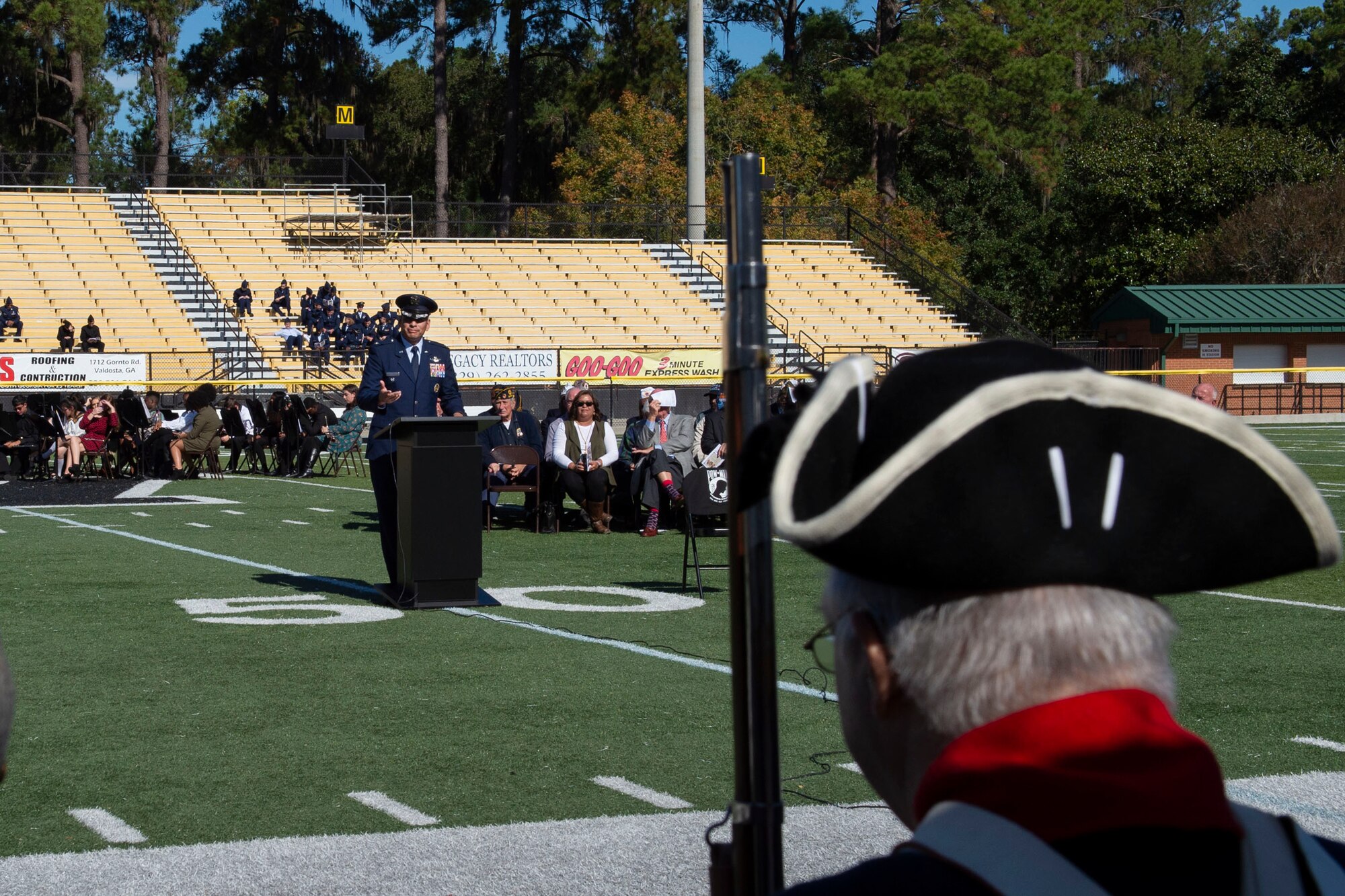 A photo of 23d Wing Vice Commander delivering keynote remarks at a Veterans Day Observance
