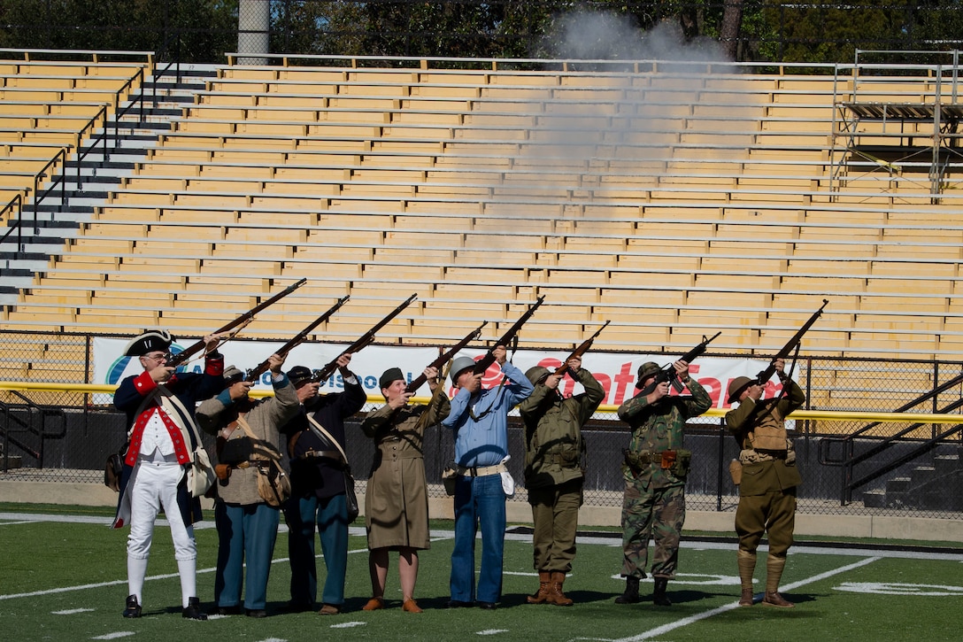 Volunteers for the C Company 61st conduct a 21-gun salute at the American Legion Post 13 Veterans Day Observance Nov. 11, 2019, in Valdosta, Ga.  This annual program honors veterans of the past and present for their service to the United States. (U.S. Air Force photo by 2nd Lt. Kaylin P. Hankerson)