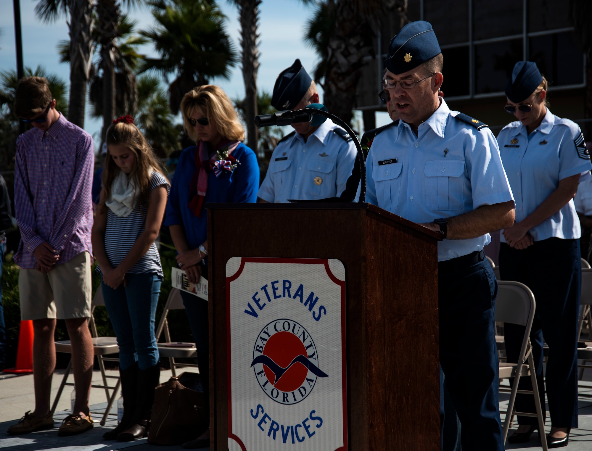 Maj. Mark Juchter, 325th Fighter Wing Religious Affairs chaplain, delivers an invocation at the annual Veterans Day parade celebration and wreath laying ceremony on Nov. 11, 2019, at Panama City, Florida. The annual event celebrated those who served in the past and to honor the sacrifices made by the service member as well as their families, both at home and abroad. (U.S. Air Force photo by Staff Sgt. Magen M. Reeves)