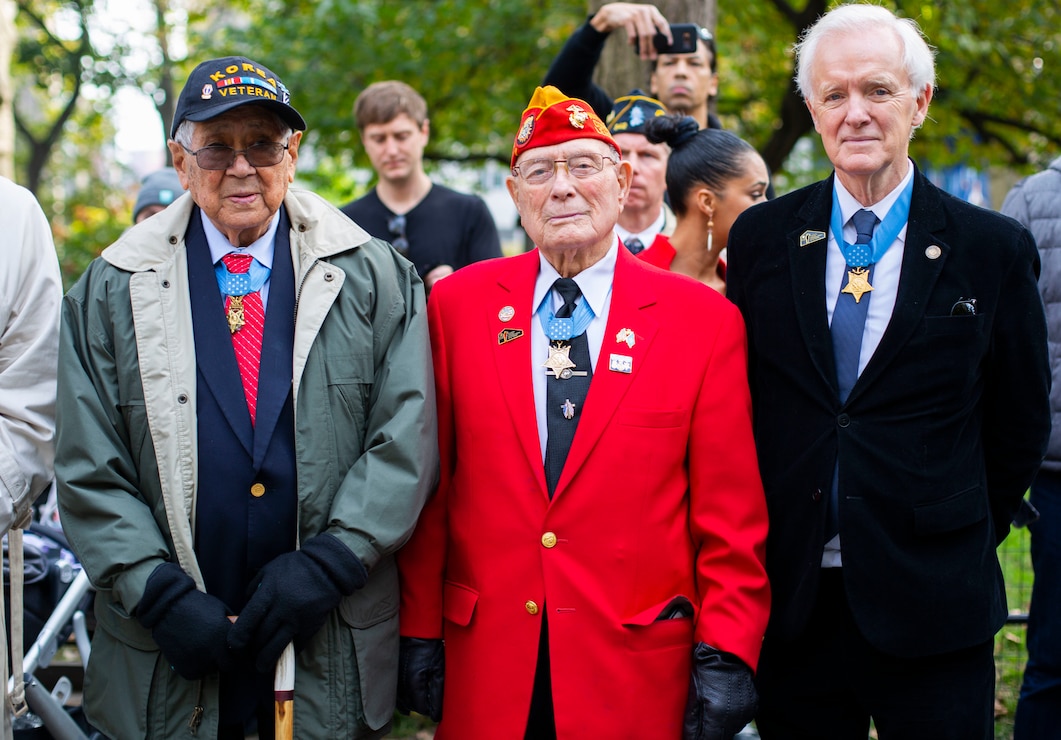 Medal of Honor recipients and grand marshals of the 2019 New York City Veterans Day Parade Army Staff Sgt. Hiroshi "Hershey" Miyamura, Marine Corps Chief Warrant Officer Four Hershel "Woody" Williams and former Senator Bob Kerrey are pictured during the parade. The 2019 parade marked its centennial anniversary and honored the Marine Corps as its featured service. Formed Nov. 10, 1775, as naval augment forces capable of fighting both at sea and on shore, the Marine Corps has secured freedom in every major conflict America has faced. Together, the Navy-Marine Corps Team enables the joint force to partner together and operate on behalf of national defense in this era of great power competition. Steeped in the core values of honor, courage and commitment, Marines bring moral, physical, and intellectual strength to every situation. When their time in uniform is done, Marines use those qualities to continue to serve their communities.