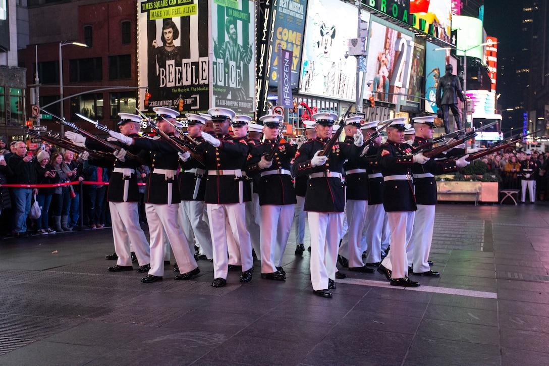 The Marine Corps Silent Drill Platoon performs in Times Square, Manhattan, New York, to celebrate the Marine Corps' 244th birthday, Nov. 10, ahead of Veterans Day. The 2019 New York City Veterans Day Parade, which marked its centennial anniversary, honored the Marine Corps as its featured service. Formed Nov. 10, 1775, as naval augment forces capable of fighting both at sea and on shore, the Marine Corps has secured freedom in every major conflict America has faced. Together, the Navy-Marine Corps Team enables the joint force to partner together and operate on behalf of national defense in this era of great power competition. Steeped in the core values of honor, courage and commitment, Marines bring moral, physical, and intellectual strength to every situation. When their time in uniform is done, Marines use those qualities to continue to serve their communities.