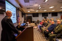 U.S. Army Col. Christopher Caldwell gives a speech during his promotion ceremony at Joint Task Force Civil Support (JTF-CS) headquarters. The ceremony was presided over by JTF-CS Commanding General U.S. Army Maj. Gen. William “Bill” Hall, and was attended by Caldwell’s family, friends and fellow JTF-CS staff. (Official DoD photo by Mass Communication Specialist 3rd Class Michael Redd/RELEASED)