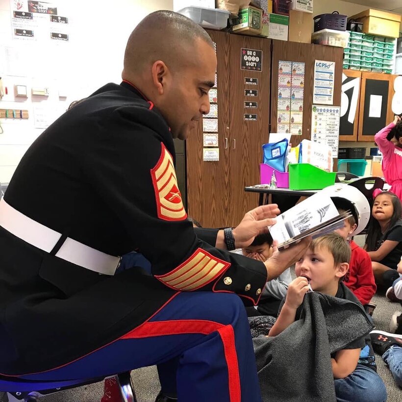 One day after celebrating the Marine Corps' 244th birthday, a few Marines from Marine Corps Logistics Base Albany celebrated Veterans Day with the local community, Nov. 11. Sgt. Maj. Jeffrey Young, sergeant major, MCLB Albany, was the guest speaker at the American Legion Post 512.  He told the near-capacity crowd that he was honored to be given the opportunity to share his perspective on the importance of the day.