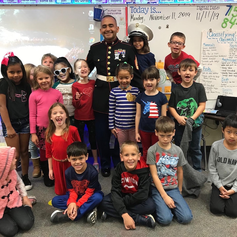 One day after celebrating the Marine Corps' 244th birthday, a few Marines from Marine Corps Logistics Base Albany celebrated Veterans Day with the local community, Nov. 11. Sgt. Maj. Jeffrey Young, sergeant major, MCLB Albany, was the guest speaker at the American Legion Post 512.  He told the near-capacity crowd that he was honored to be given the opportunity to share his perspective on the importance of the day.