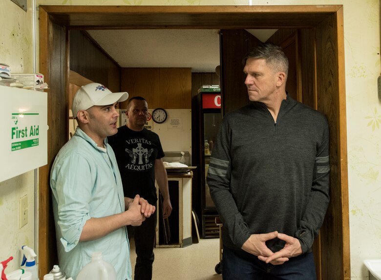 From right, U.S. Army Maj. Gen. Peter Andrysiak, U.S. Army Alaska commander, listens to U.S. Army Capt. Jeffrey Andrews, 626th Quartermaster Field Feeding Company commander, at the Eagle River VFW, Alaska, Nov. 9, 2019. The purpose of the event was to honor those who served in the military. Soldiers from the 9th Army Band and culinary specialist from the 626th Quartermaster Field Feeding Company volunteered to support the ceremony. Soldiers from the 626th Quartermaster have volunteered more than 100 hours to the Eagle River VFW.