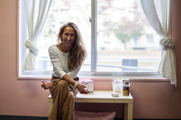Hailey Smits, the 35th Fighter Wing Pantry coordinator, pauses for a photo at Misawa Air Base, Japan, Oct. 31, 2019. Active duty members and their families can pick up 10 non-perishable, shelf-stable and non-expired packing food items at no cost each month. (U.S. Air Force photo by Airman 1st Class China M. Shock)