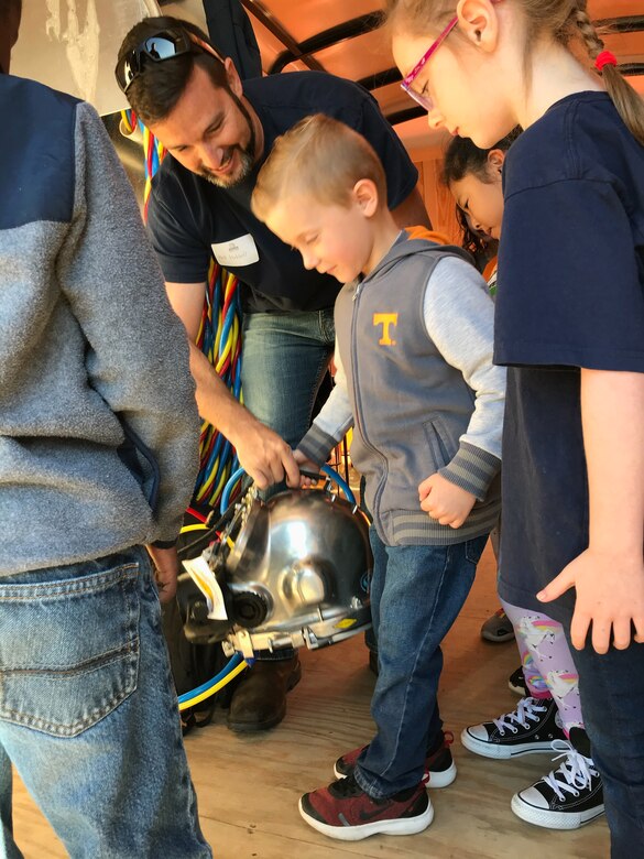 Matthew Hubbell, maintenance mechanic at the U.S. Army Corps of Engineers Nashville District’s Cordell Hull Lake Resource Manager’s Office, explains what is involved with being a Corps of Engineers diver with kids at a local school Oct. 23, 2019. Hubbell is the Nashville District employee of the month for September 2019. (USACE Photo by Cole Johnson)