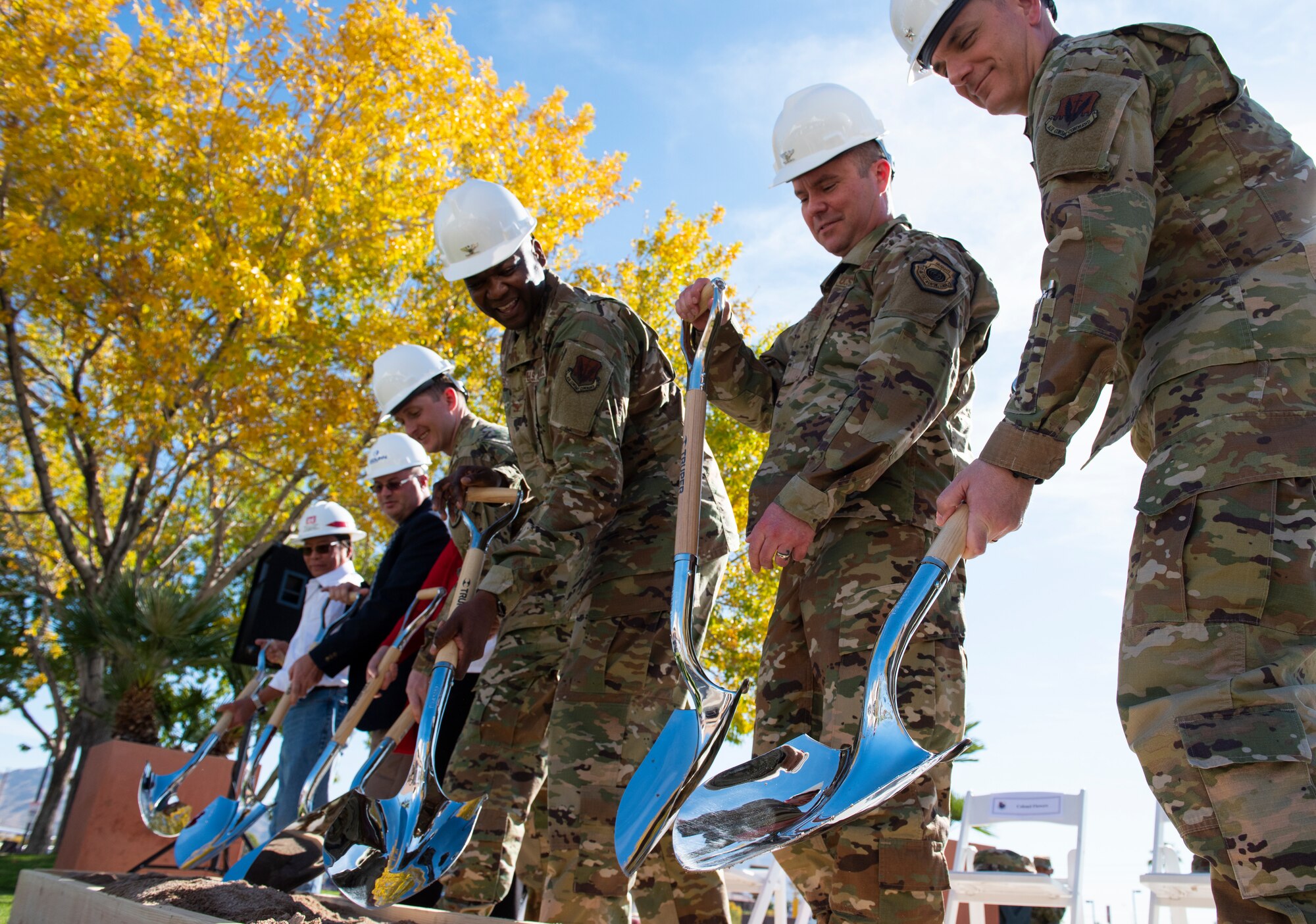 Nellis Air Force Base and City of Las Vegas leadership break ground on a new trauma center during a ceremony celebrating the Mike O’Callaghan Military Medical Center’s 25th Anniversary on Nellis Air Force Base, Nevada, Nov. 12, 2019. The ground breaking marks the beginning of a three year endeavor for the MOMMC to become a level three trauma center. (U.S. Air Force photo by Senior Airman Kevin Tanenbaum)