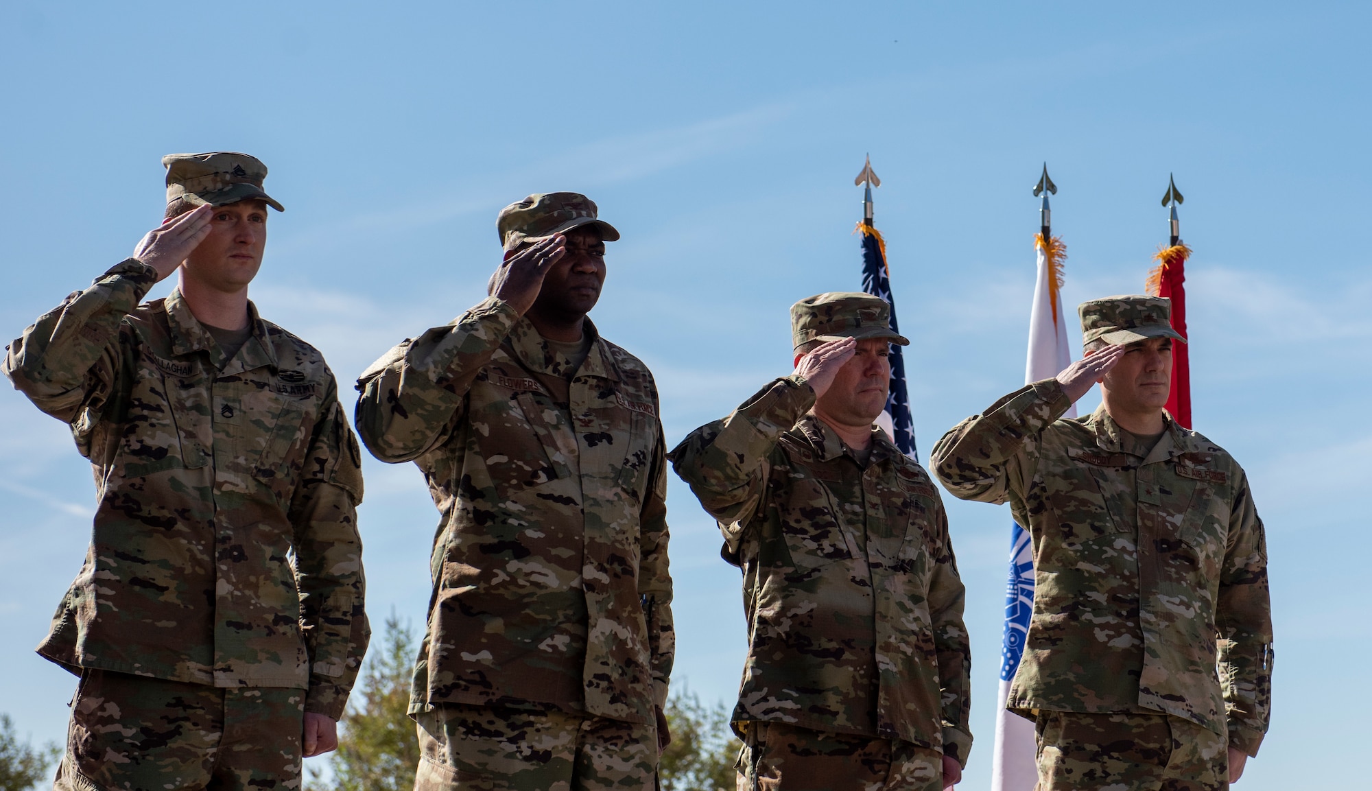 Members of Nellis leadership render a salute as the National Anthem plays during a ceremony celebrating the Mike O’Callaghan Military Medical Center’s 25th anniversary at Nellis Air Force Base, Nevada, Nov. 12, 2019. During a ceremony that was attended by base and community leadership, the MOMMC celebrated O’Callaghan and 25 years of operations. (U.S. Air Force photo by Senior Airman Kevin Tanenbaum)