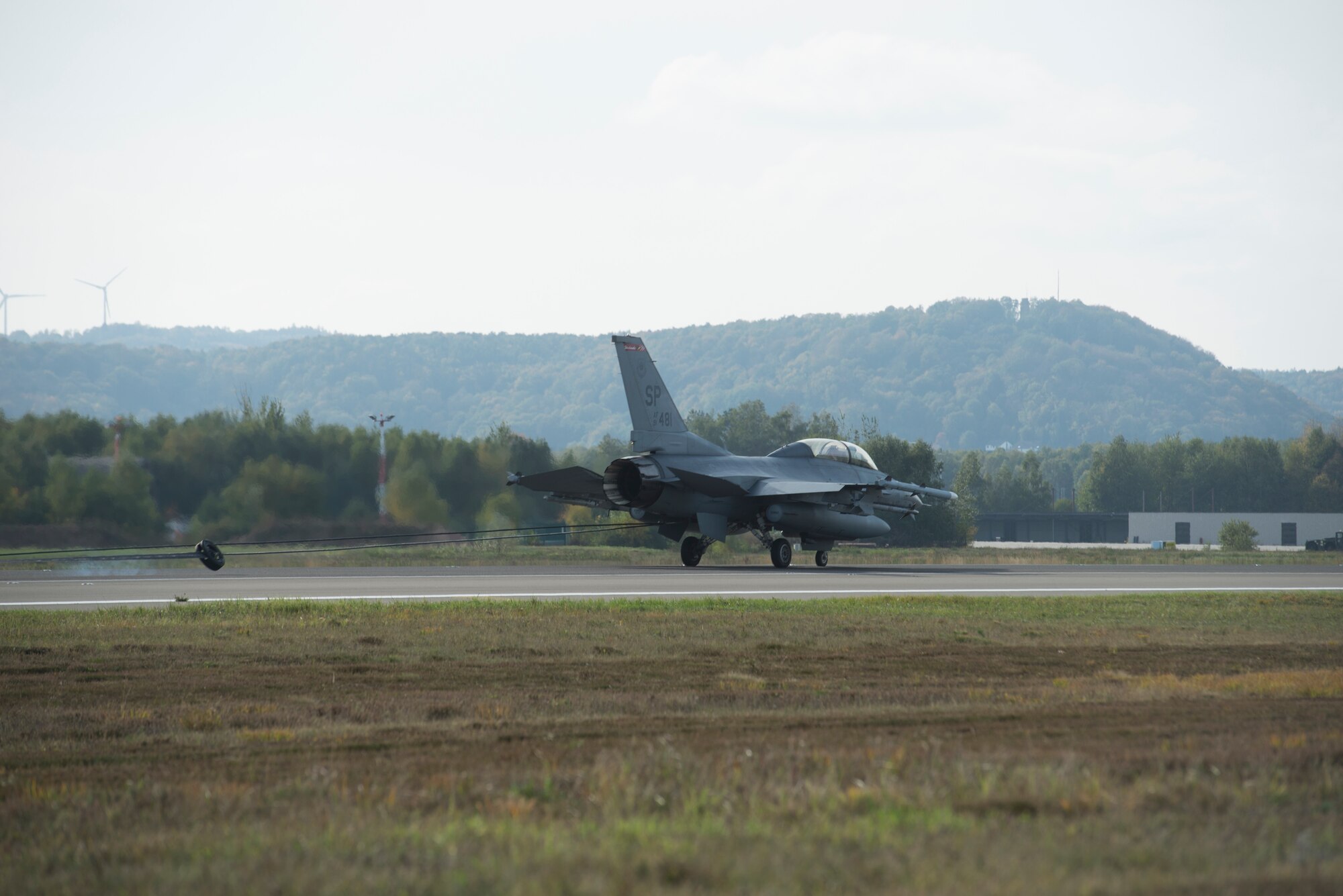 An U.S. Air Force F-16 Fighting Falcon assigned to Spangdahlem Air Base, Germany rests after hooking onto the aircraft arresting system at Ramstein Air Base, Germany, Oct. 28, 2019. Ramstein AB is annually certified on aircraft arresting systems in the event other bases may need to use them.