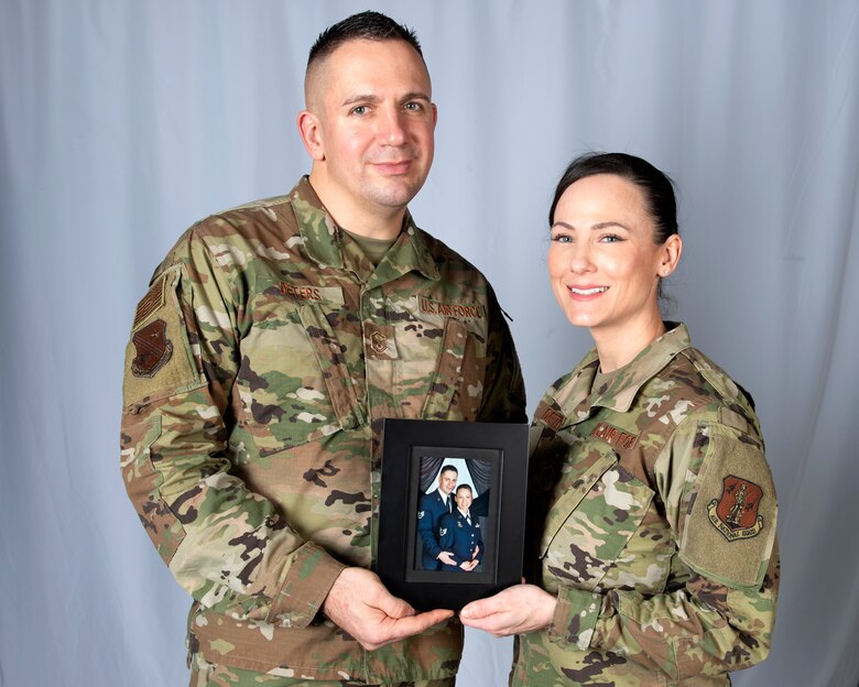 Alaska Air National Guard Master Sergeants Franz and Jessica Deters, pose for a photo at Joint Base Elmendorf-Richardson, Alaska, Nov. 7, 2019. Franz and Jessica are both assigned to the 176th Force Support Flight as a sustainment services superintendent and installation personnel readiness specialist respectively. The Deters, who married in 2012, transitioned to the ANG after serving in the U.S. Marine Corps.