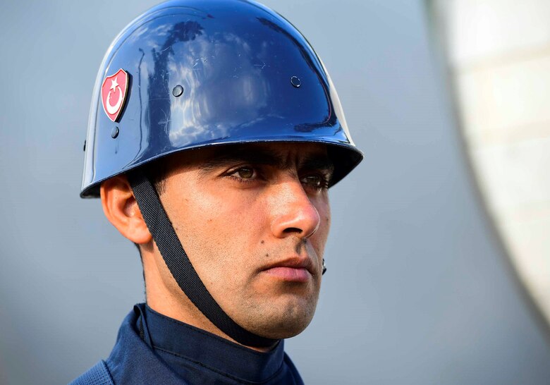 A member of the Turkish air force stands at attention during the Ataturk Memorial Day Ceremony Nov. 10, 2019, at Incirlik Air Base, Turkey. During the day of remembrance, the entire country pauses for two minutes at 9:05 a.m., and the beginning of silence is marked by blowing sirens, car horns, trains, ships and factory whistles.