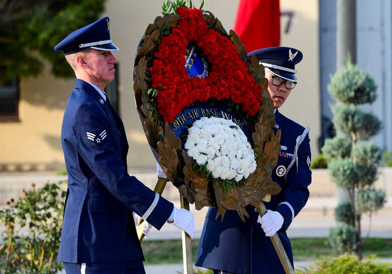 Members of the 39th Air Base Wing Honor Guard deliver a wreath during the Ataturk Memorial Day Ceremony Nov. 10, 2019, at Incirlik Air Base, Turkey. The U.S. Airmen stood shoulder to shoulder with their Turkish partners during the annual ceremony to recognize Mustafa Kemal’s efforts to modernize Turkey.