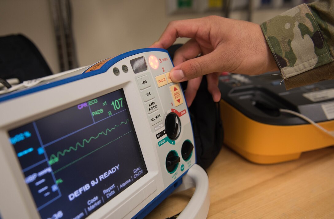 U.S. Air Force Airman 1st Class Timothy Torres, 633rd Medical Group biomedical equipment technician, turns on a defibrillator at Joint Base Langley-Eustis, Virginia, Nov. 8, 2019. Torres enjoys working as a BMET because he gets to do something new in his job each day. (U.S. Air Force photo by Airman 1st Class Sarah Dowe)
