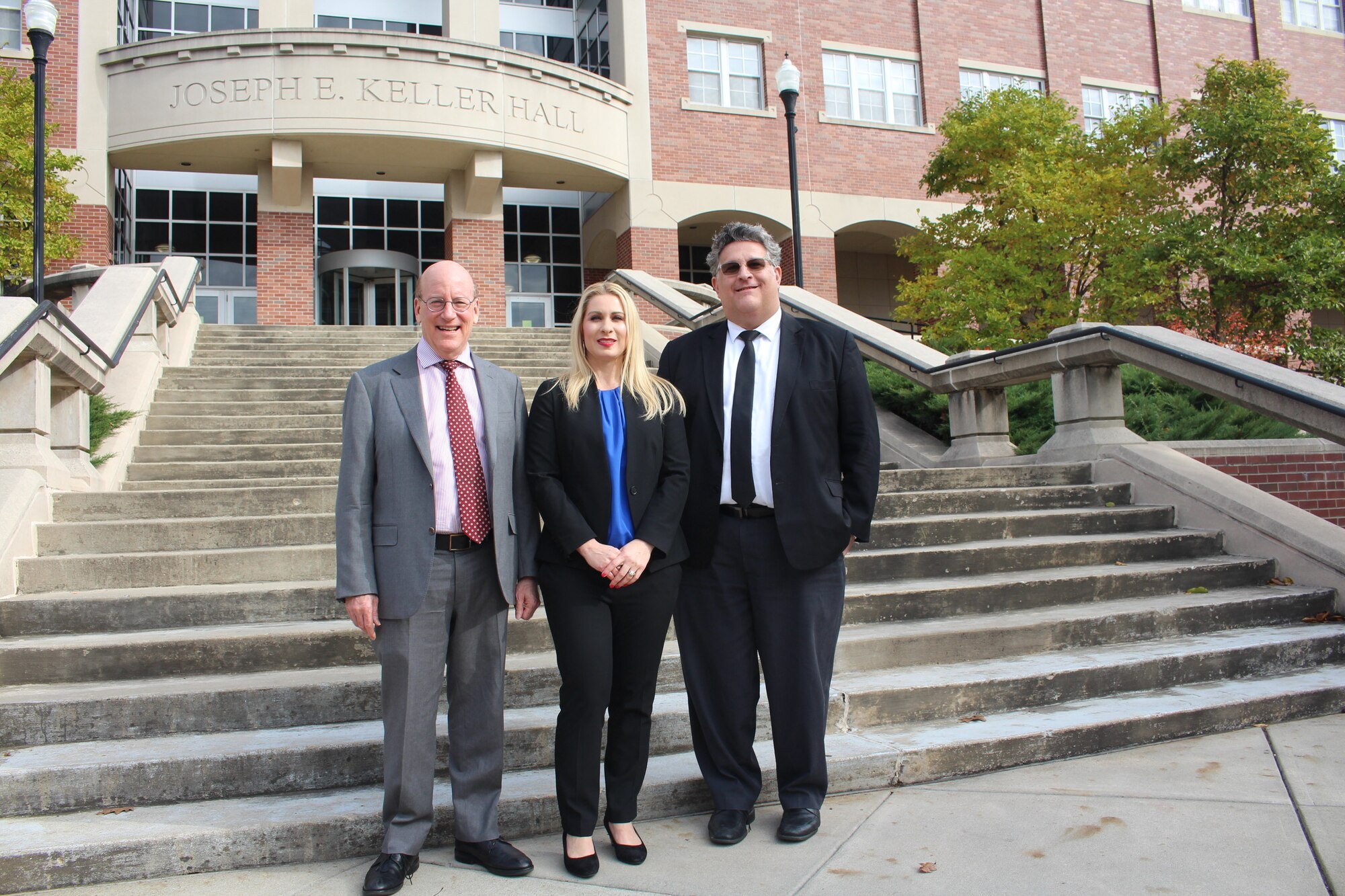 The University of Dayton School of Law and the Air Force Research Laboratory at Wright-Patterson Air Force Base have entered into a three-year educational partnership agreement for the School of Law to provide AFRL engineers and scientists legal training in the area of patents. From left: Andrew Strauss, Dean of the University of Dayton School of Law; Sabra Tomb, AFRL's partnership program manager; and Paul Schlottman, Director of Strategic Initiatives, University of Dayton School of Law in front of the University of Dayton School of Law, located in the Joseph E. Keller Hall, 300 College Park, Dayton. The School of Law and AFRL hope to place 50 employees in the online program per semester. The program begins in January. (Courtesy photo/Shawn Robinson)