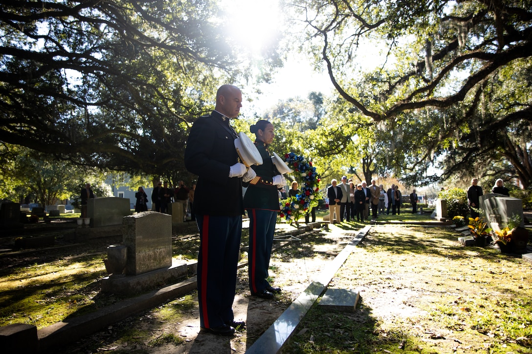 Col. Walker Field, chief of staff of Marine Forces Reserve, and 1st Sgt. Sigrid Rivera, company first sergeant, bow their heads in prayer above Robert Barrow’s tombstone at a wreath laying ceremony at Grace Episcopal Church, Saint Francisville, Louisiana, Nov. 10, 2019. Robert Barrow, the 27th Commandant, was the first Commandant in Marine Corps history to be buried in his hometown. (U.S. Marine Corps photo by Lance Cpl. Christopher England)