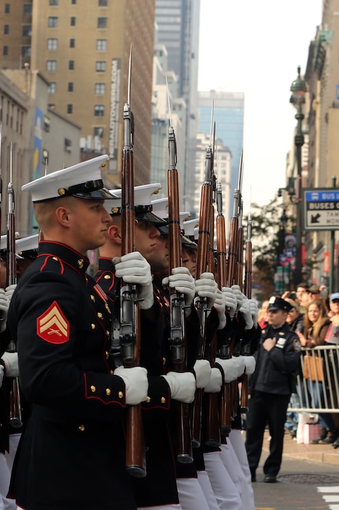 Marines with the U.S. Marine Corps Silent Drill Platoon march in formation during the 2019 Veteran’s Day Parade in New York, New York, Nov. 11, 2019. The Veteran’s Day Parade is hosted annually to commemorate the service and sacrifice of service members and their families.
