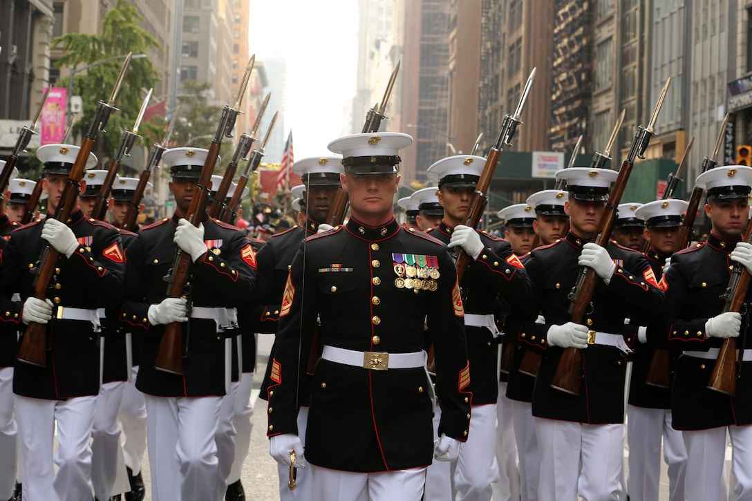 Marines with the U.S. Marine Corps Silent Drill Platoon march in formation during the 2019 Veteran’s Day Parade in New York, New York, Nov. 11, 2019. The Veteran’s Day Parade is hosted annually to commemorate the service and sacrifice of service members and their families.