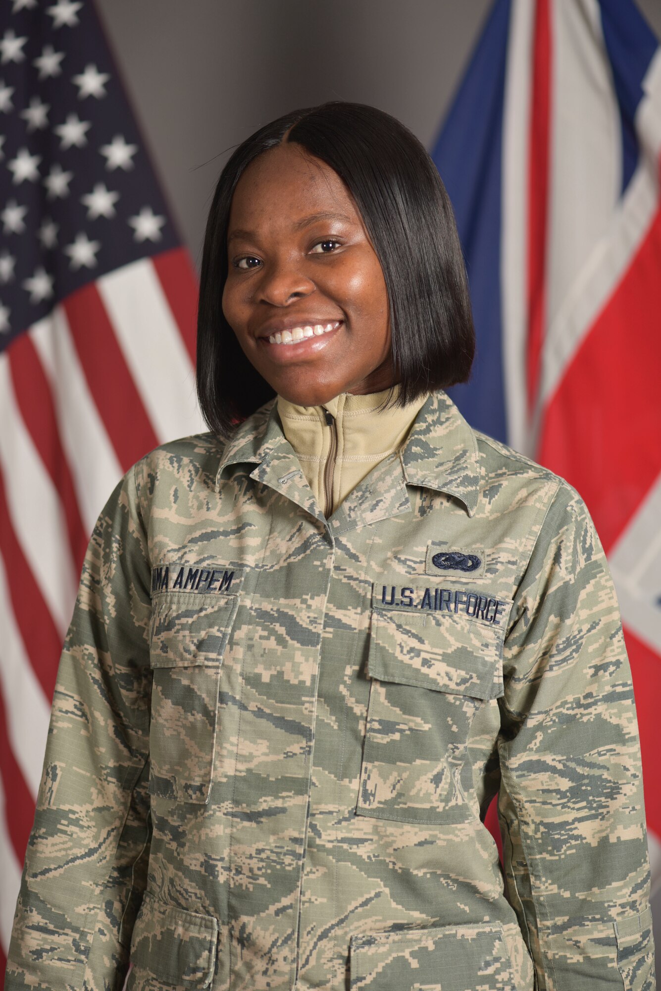 U.S. Air Force Airman 1st Class Adwoa Anima Ampem, 100th Logistics Readiness Squadron supply equipment apprentice, poses for a picture at RAF Mildenhall, England, Nov. 5, 2019. As an Airman, Ampem is on her way to full citizenship as a new member of Team Mildenhall. (U.S. Air Force photo by Senior Airman Alexandria Lee)