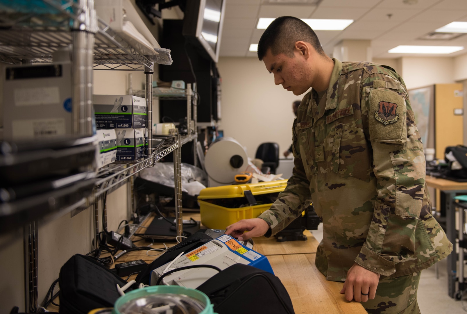 U.S. Air Force Airman 1st Class Timothy Torres, 633rd Medical Group biomedical equipment technician, prepares to repair a defibrillator at Joint Base Langley-Eustis, Virginia, Nov. 8, 2019. BMETs provide timely equipment repair to the hospital helping to ensure patient care. (U.S. Air Force photo by Airman 1st Class Sarah Dowe)