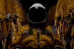 A U-2 Dragon Lady pilot poses for a portrait inside a pressure suit at Beale Air Force Base, California, October 31, 2019. Pilots who are flying into the rim of the atmosphere require a specialized and cuA U-2 Dragon Lady pilot poses for a portrait inside a pressure suit at Beale Air Force Base, California, October 31, 2019. Pilots who are flying into the rim of the atmosphere require a specialized and custom suit to their measurements keeping them at a normal altitude while going to extreme elevations.stom suit to their measurements keeping them at a normal altitude while going to extreme elevations.