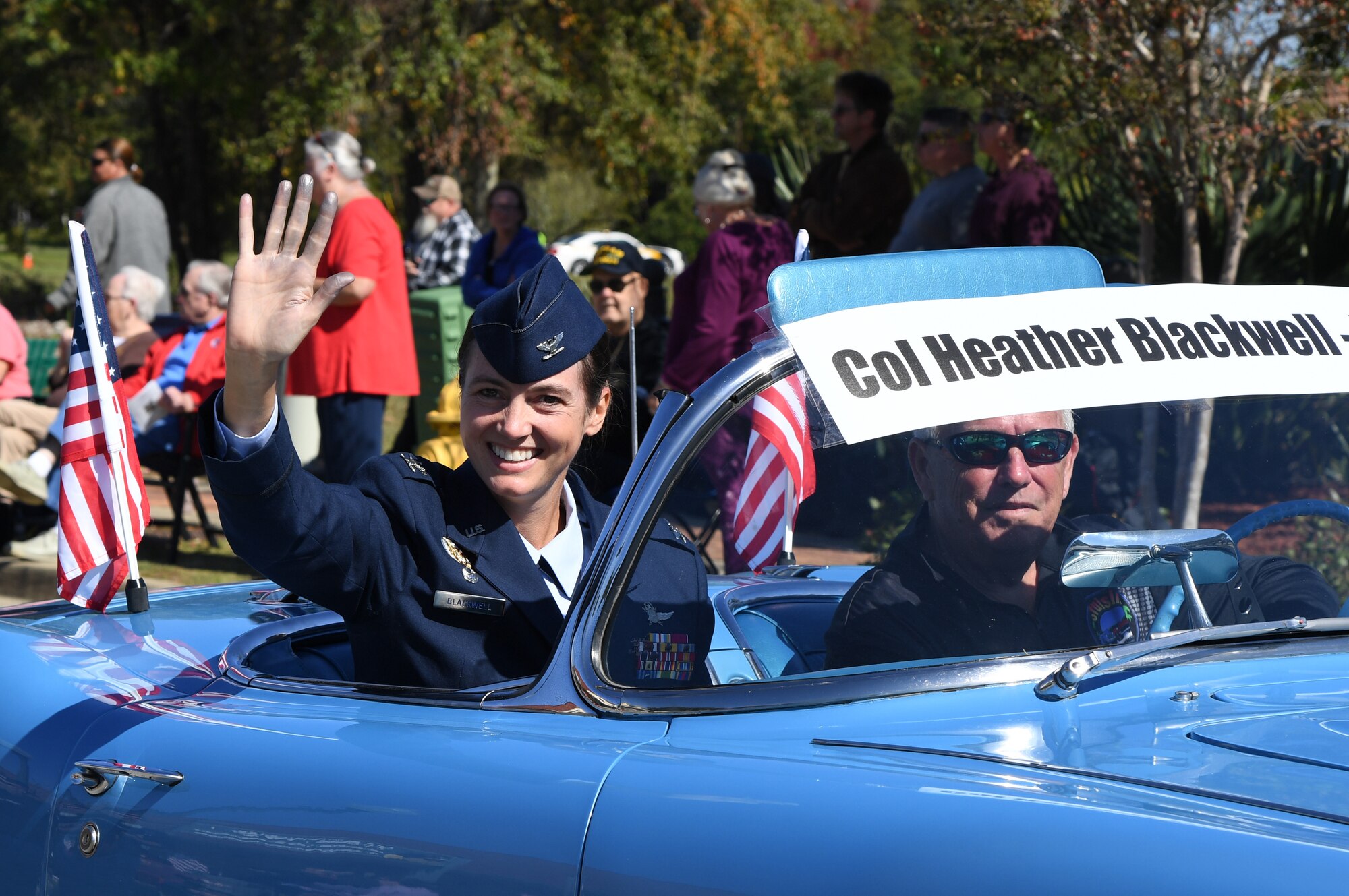 U.S. Air Force Col. Heather Blackwell, 81st Training Wing commander, waves to the crowd during the 19th Annual Gulf Coast Veterans Day Parade in DíIberville, Mississippi, Nov. 9, 2019. Keesler Air Force Base leadership, along with hundreds of Airmen, attended and participated in the largest Veterans Day parade on the Gulf Coast. (U.S. Air Force photo by Kemberly Groue)