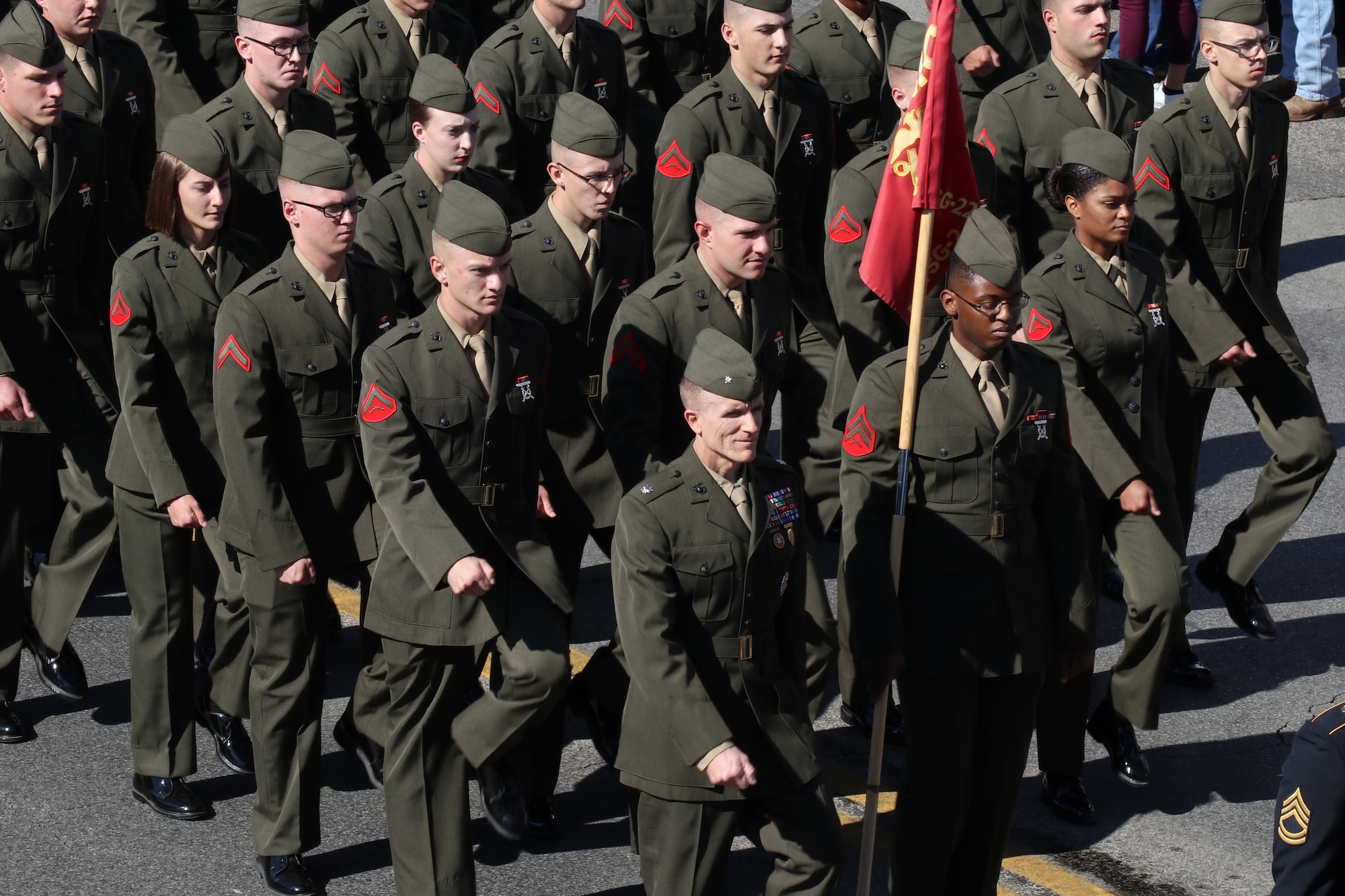 U.S. Marine Corps Lt. Col. Earl Patterson, Marine Corps Detachment Goodfellow Air Force Base commander, leads his troops during the Veterans Day Parade in San Angelo, Texas, Nov. 9, 2019. Goodfellow members from each branch marched in the parade to show their support. (U.S. Air Force photo by Airman 1st Class Zachary Chapman/Released)