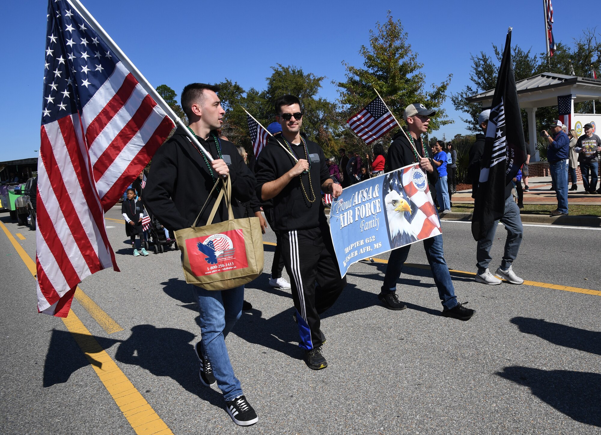 Air Force Sergeants Association members march in the 19th Annual Gulf Coast Veterans Day Parade in DíIberville, Mississippi, Nov. 9, 2019. Keesler Air Force Base leadership, along with hundreds of Airmen, attended and participated in the parade in support of all veterans past and present. More than 70 unique floats, marching bands and military units marched in the largest Veterans Day parade on the Gulf Coast. (U.S. Air Force photo by Kemberly Groue)