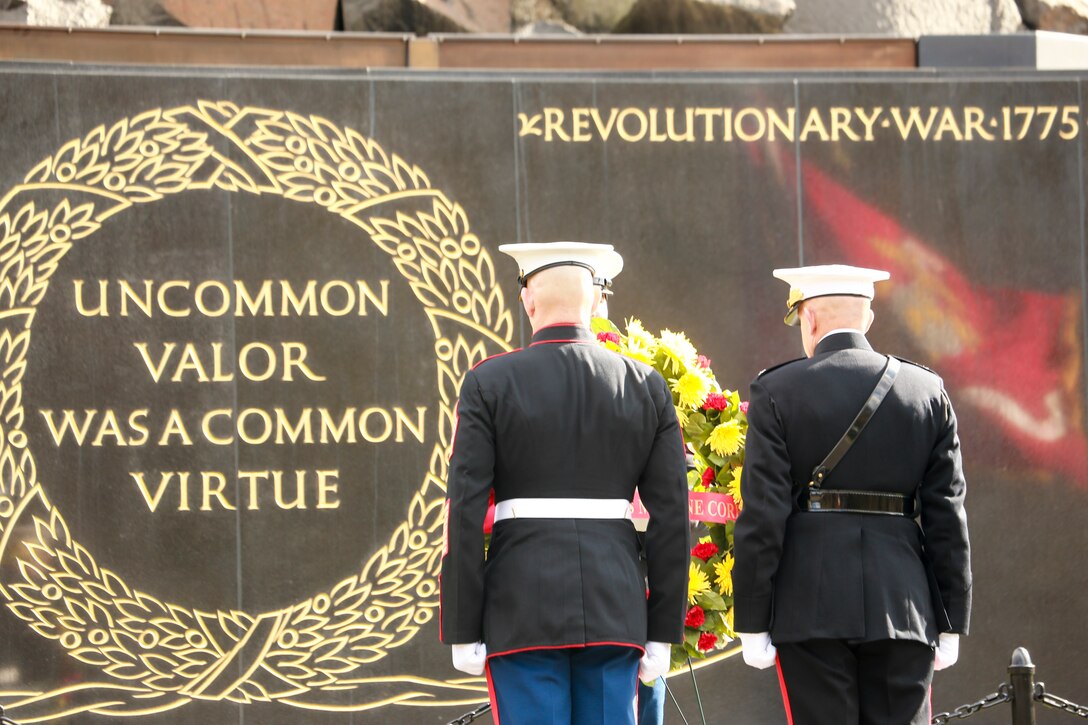 General David H. Berger, commandant of the Marine Corps, and Sgt. Maj. Troy E. Black, sergeant major of the Marine Corps, stand at the position of attention during a Wreath Laying Ceremony at the Marine Corps War Memorial Arlington, Virginia, Nov. 8, 2019. Small teams of Marines also visited several gravesites of former commandants of the Marine Corps to render honors to these Marines. These ceremonies are held to celebrate these Marines’ love and devotion to their Corps and Country, and to celebrate the Marine Corps birthday. (U.S. Marine Corps photo by Cpl. James Bourgeois)