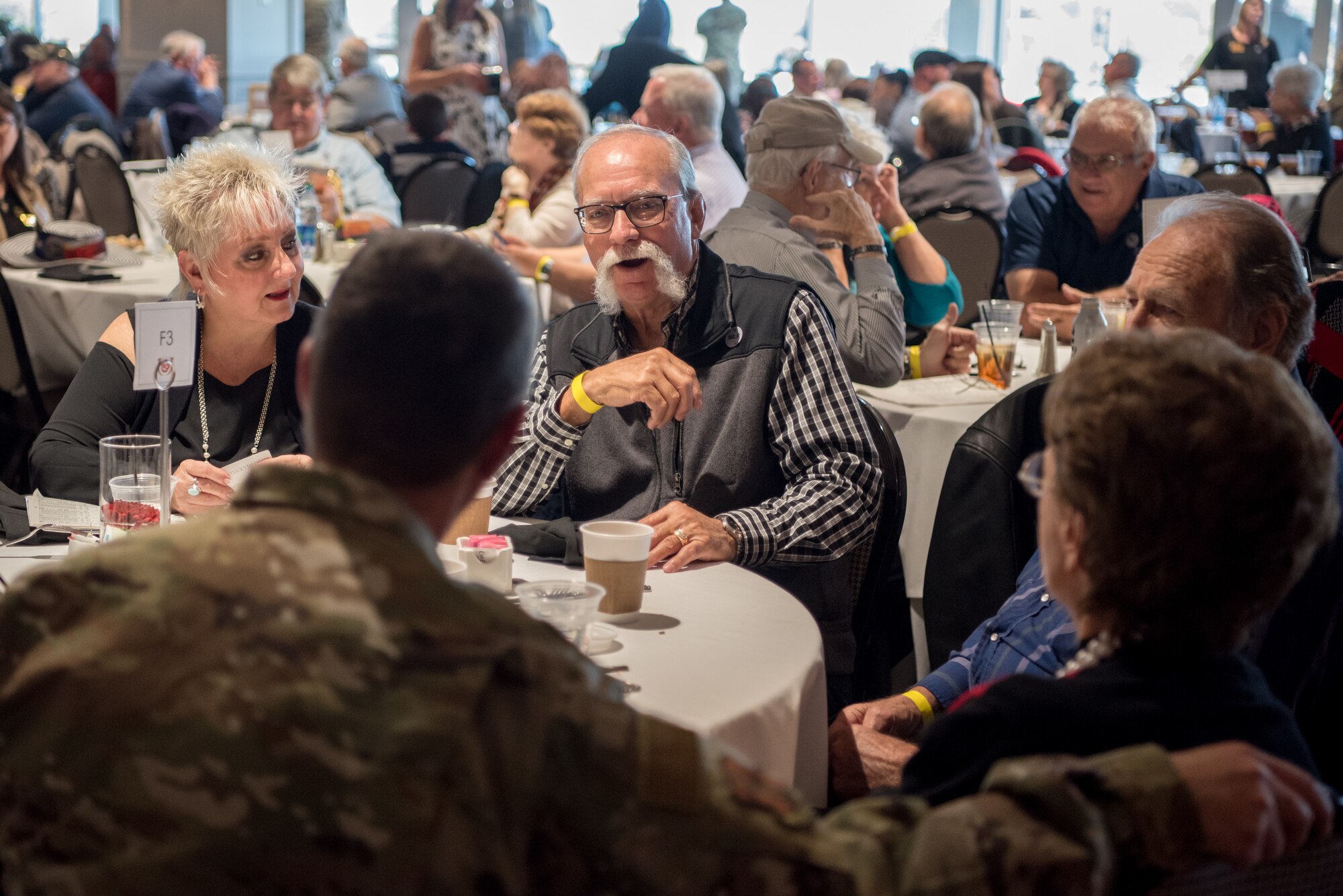 Air Force Gen. Joseph Lengyel, chief of the National Guard Bureau, speaks with Gold Star family members at the tenth annual Survivors Day at the Races at Churchill Downs in Louisville, Ky., Nov. 3, 2019. The event welcomed nearly 1,000 family members of fallen service members for a day of fellowship and healing. (U.S. Air National Guard photo by Staff Sgt. Joshua Horton)