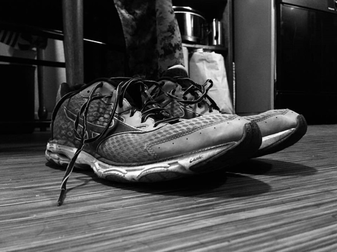 U.S. Marine Gunnery Sgt. Lukas Atwell, the Communication Strategy and Operations staff noncommissioned officer in charge with 1st Marine Division, wore these shoes as he walked 64.82 miles in a 24-hour period to raise money for charity, Oct. 19, 2019.  Atwell raised more than $6 thousand dollars in support of over 20 charities through pledges. (Photo courtesy Gunnery Sgt. Lukas Atwell)
