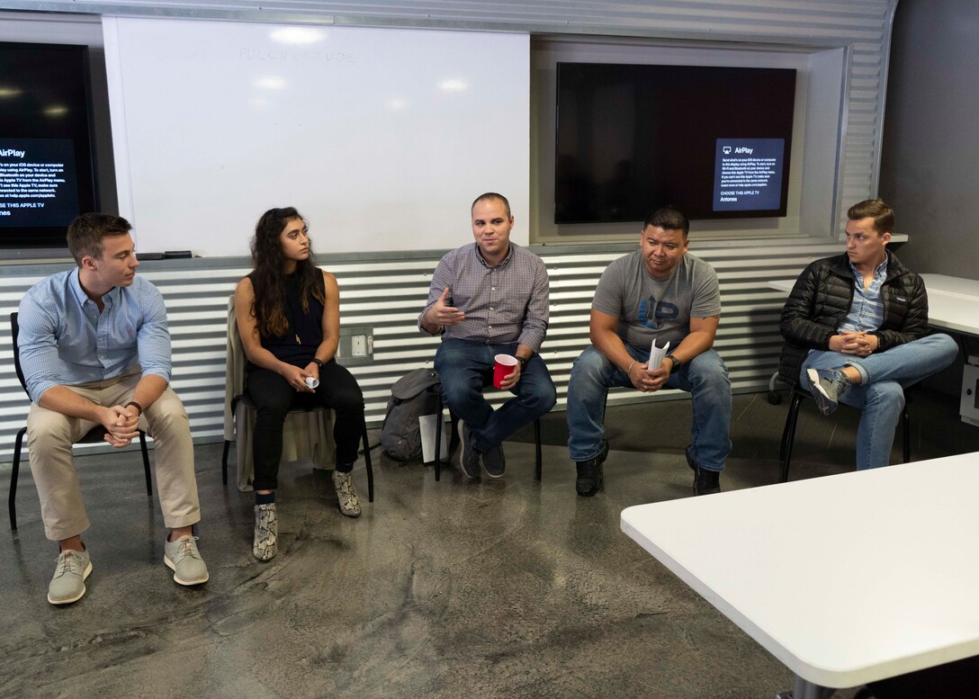Members of the U.S. Air Force’s solution center teams from LevelUP, KesselRun, Space CAMP, and Shadow OC sit on a panel during Project NEXUS’ final mentorship event at the AFWERX Austin Hub, Texas, Oct. 16, 2019. Designed by the Air Education and Training Command Technology Integration Detachment, the beta test program was designed to fuel organic technology problem solving efforts for Airmen in their day-to-day workplaces with skills like software development, data science, and user interface/user experience design.(Air National Guard Photo by Staff Sgt. Jordyn Fetter)