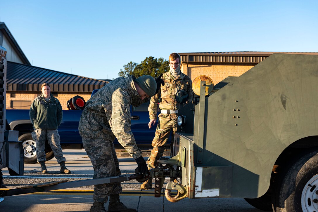 Airmen assigned to the 23d Logistics Readiness Squadron (LRS) secure cargo during exercise FT 20-01 Nov. 13, 2019, at Moody Air Force Base, Ga. FT 20-01 is a force generation exercise designed to validate the 23d Wing's ability to deploy the 75th Fighter Squadron in support of contingency operations. The 23d LRS conducted a staging area for cargo and equipment where they ensured all resources were properly weighed prior to being loaded onto a simulated aircraft. (U.S. Air Force photo by Senior Airman Erick Requadt)