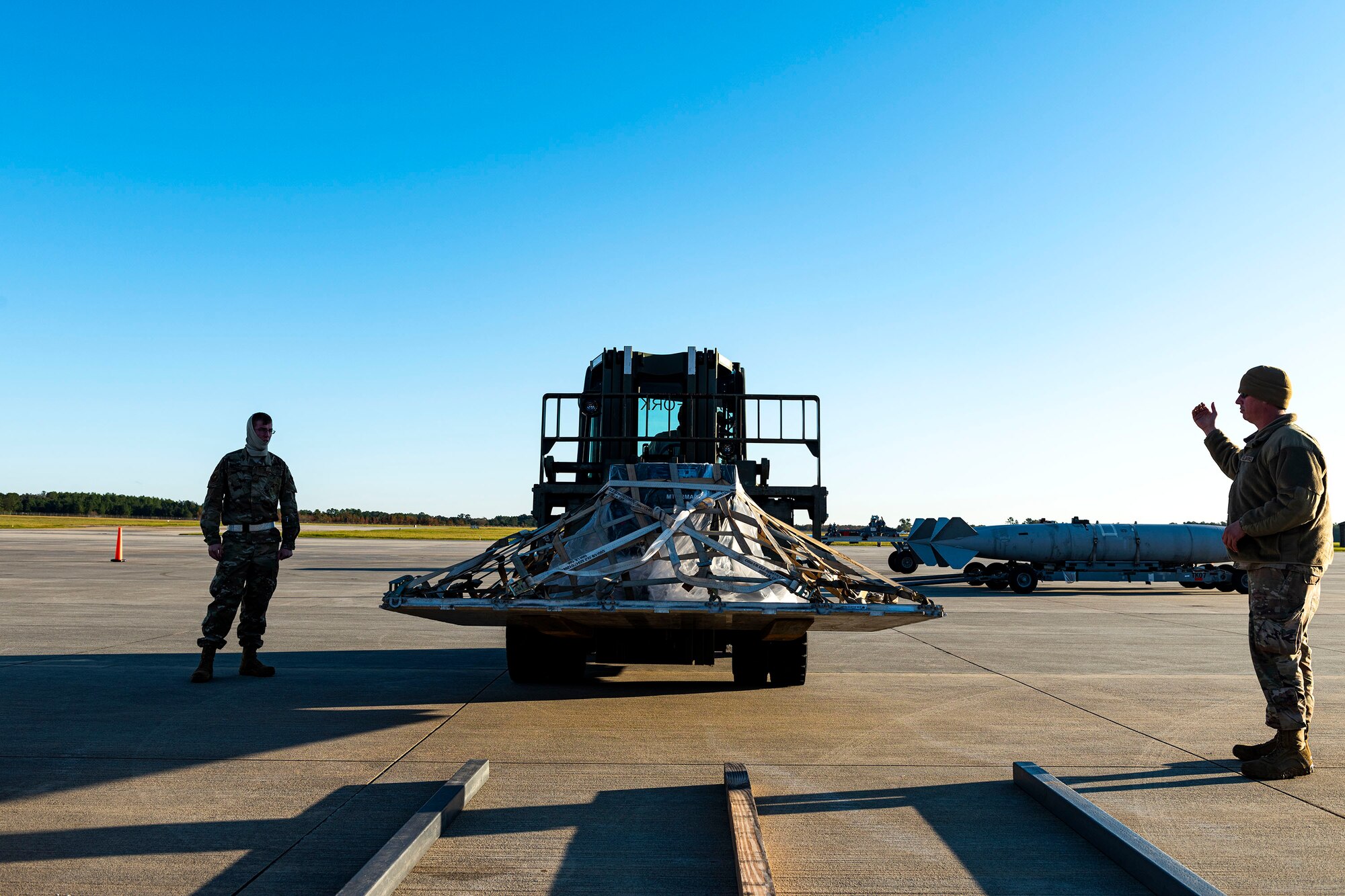 A photo of Airmen marshalling equipment during an exercise