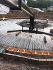 Photo of workers installing two 600,000 gallon tanks