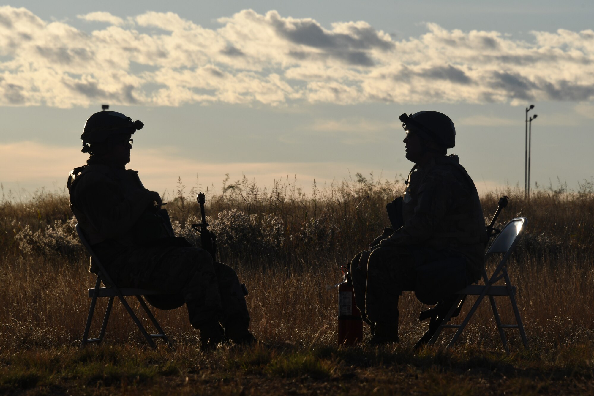 A photo of two airmen defending the base.