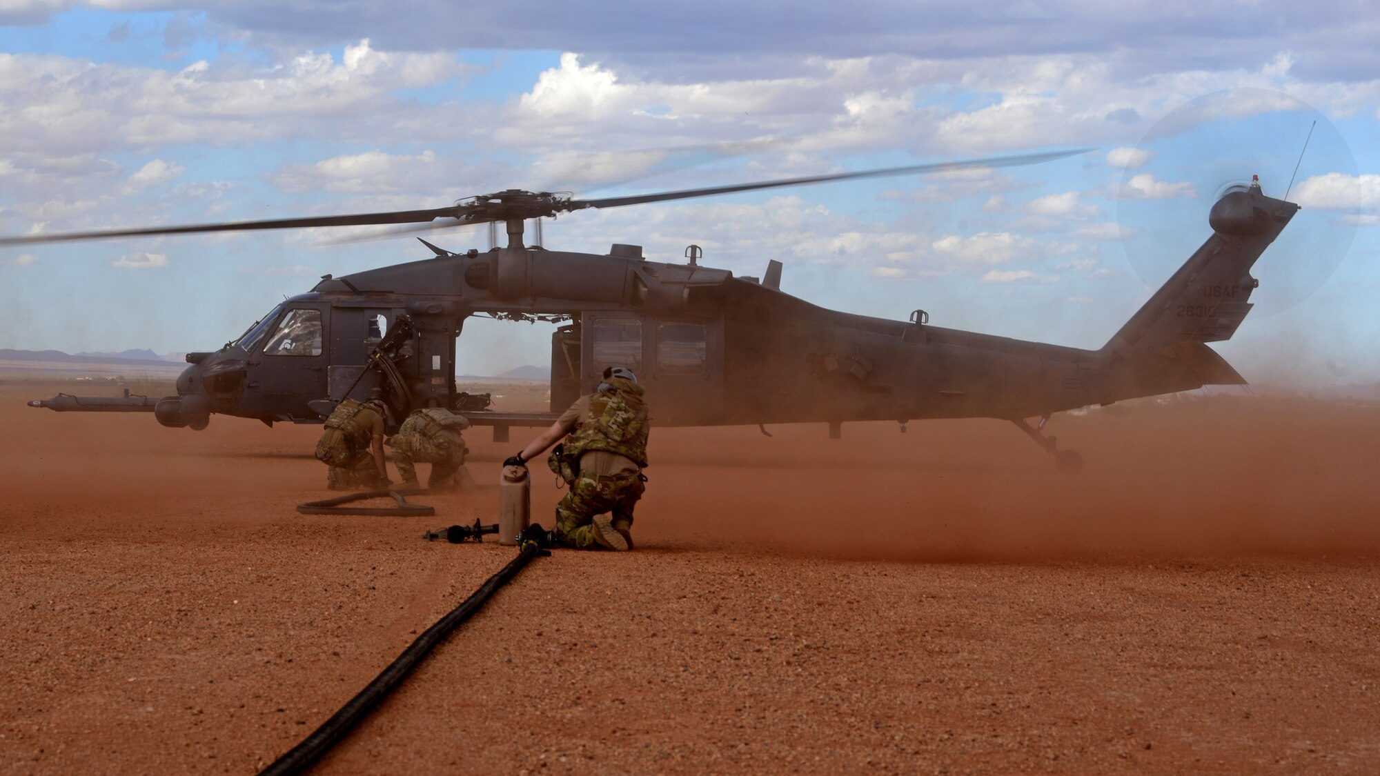 a photo of airmen performing forward area refueling operations