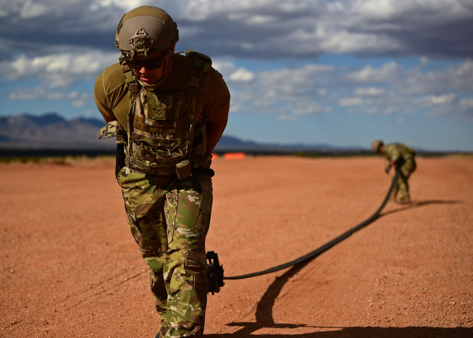 a photo of airmen performing forward area refueling operations