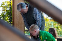 Marine Corps Air Station Iwakuni residents and Iwakuni locals bow during a Cultural Adaptation Program trip to the Iwakuni Shirohebi Shrine in Iwakuni, Japan, Nov. 1, 2019. The visit to the shrine gave station residents the opportunity to learn the history of, and interact with, the white snake species.(U.S. Marine Corps photo by Cpl. Angelo Sagum)