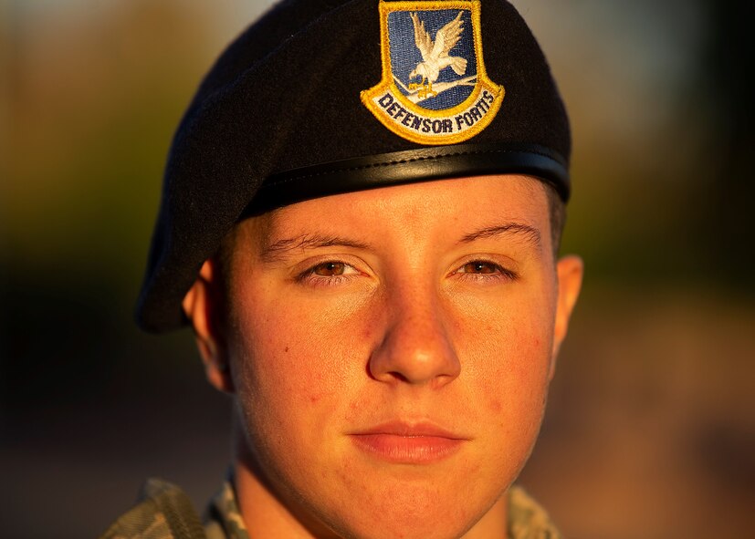 A Security Force member stands for a photo.