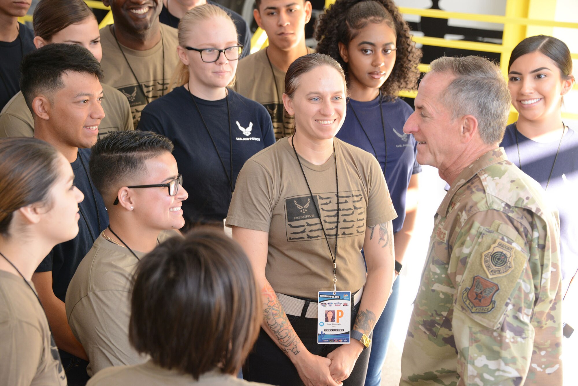 Gen. David. L. Goldfein, the Air Force chief of staff, talks to a group of 20 soon to be Airmen during the Bluegreen Vacations 500 NASCAR race in Phoenix