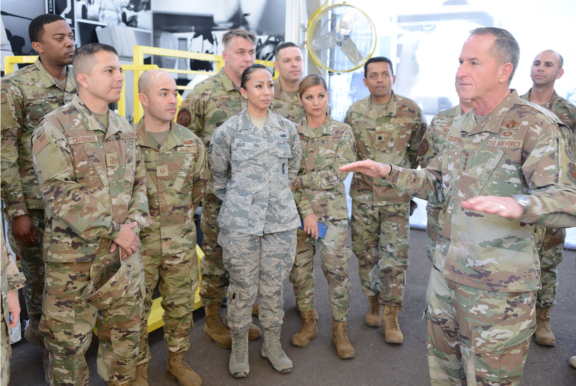 Gen. David. L. Goldfein, the Air Force chief of staff, talks to a group of total force recruiters during the Bluegreen Vacations 500 NASCAR race in Phoenix