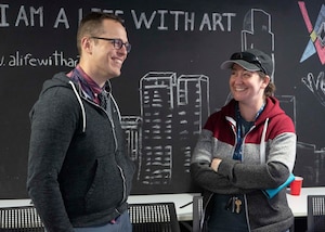 Maj. Adam Messer, left, Air Force Operations Research Analyst career field assignments officer, and Maj. Rachel Ramirez, right, Project NEXUS student, talk following the course’s final mentorship event at the AFWERX-Austin hub, Oct. 16, 2019. Members of the U.S. Air Force’s solution center teams from LevelUP, KesselRun, Space CAMP, and Shadow OC visited the students for a panel discussion on topics like talent management and developing digital competencies within the Air Force. (Air National Guard Photo by Staff Sgt. Jordyn Fetter)