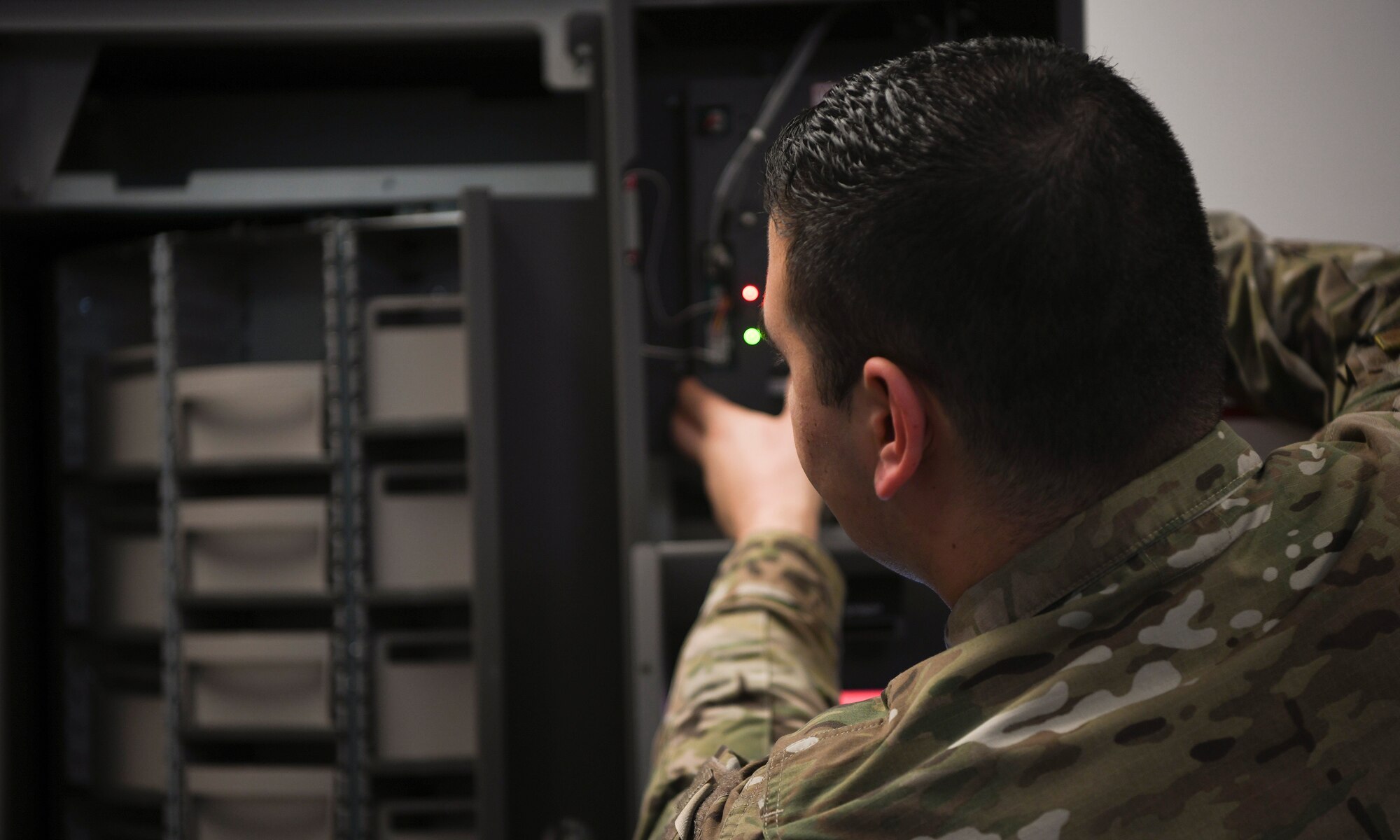 U.S. Air Force Staff Sgt. Slade Muraira, 437th Aircraft Maintenance Squadron Support shift leader, inspects a newly acquired auto-crib machine that was purchased for the squadron at Joint Base Charleston, S.C., Nov. 8, 2019. The new auto-mated tool crib will be able to hold the same amount of tools and maintenance parts and only take up half the space. The Airmen and NCOs of the support tool room went through a yearlong process of requesting and justifying the purchase of an automated tool crib to not only improve the quality of life for their Airmen in the shop, but also to increase their shop’s positive impact on the Joint Base Charleston flightline. The tool crib will save over 1000 man hours in labor by automatically keeping accountability of any of the tools and parts that are checked out as well as assisting in keeping a constant inventory on items in stock. The machine will also notify members when new parts should be ordered based on the supply and demand tempo of each individual part.