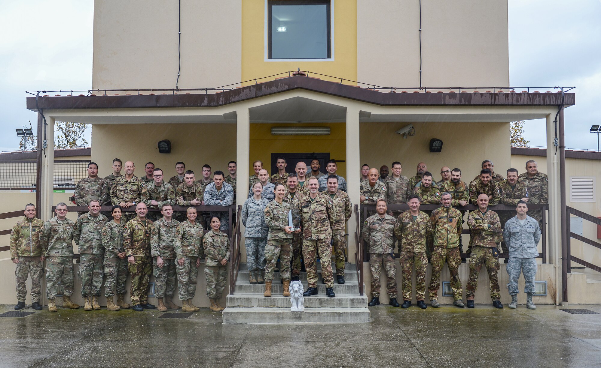 Members of the 31st Operations Support Squadron pose for a photo at Aviano Air Base, Italy, Nov. 8, 2019. The squadron won the 2018 USAF D. Ray Hardin Air Traffic Control Facility of the Year Award, which recognizes outstanding accomplishments from Air Traffic Control teams. (U.S. Air Force photo by Airman Thomas S. Keisler IV)