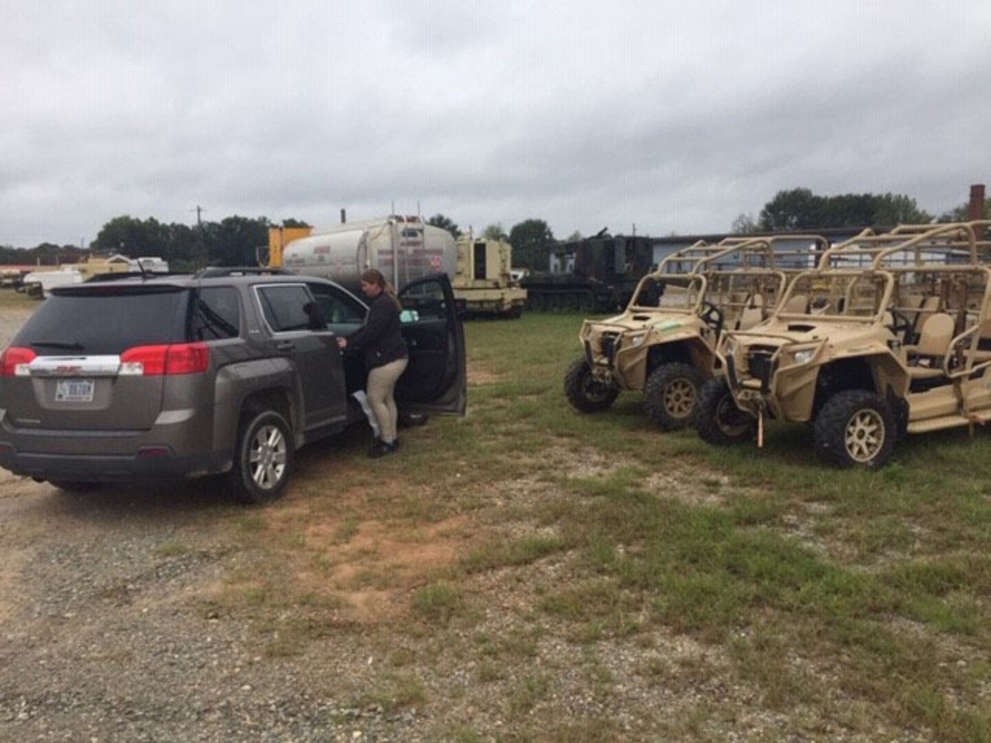 Kelly Clabbers, a Fort Benning-based disposal service representative uses the Mobile Office equipment to print labels for the all-terrain vehicles she is receiving in place at the supported unit.