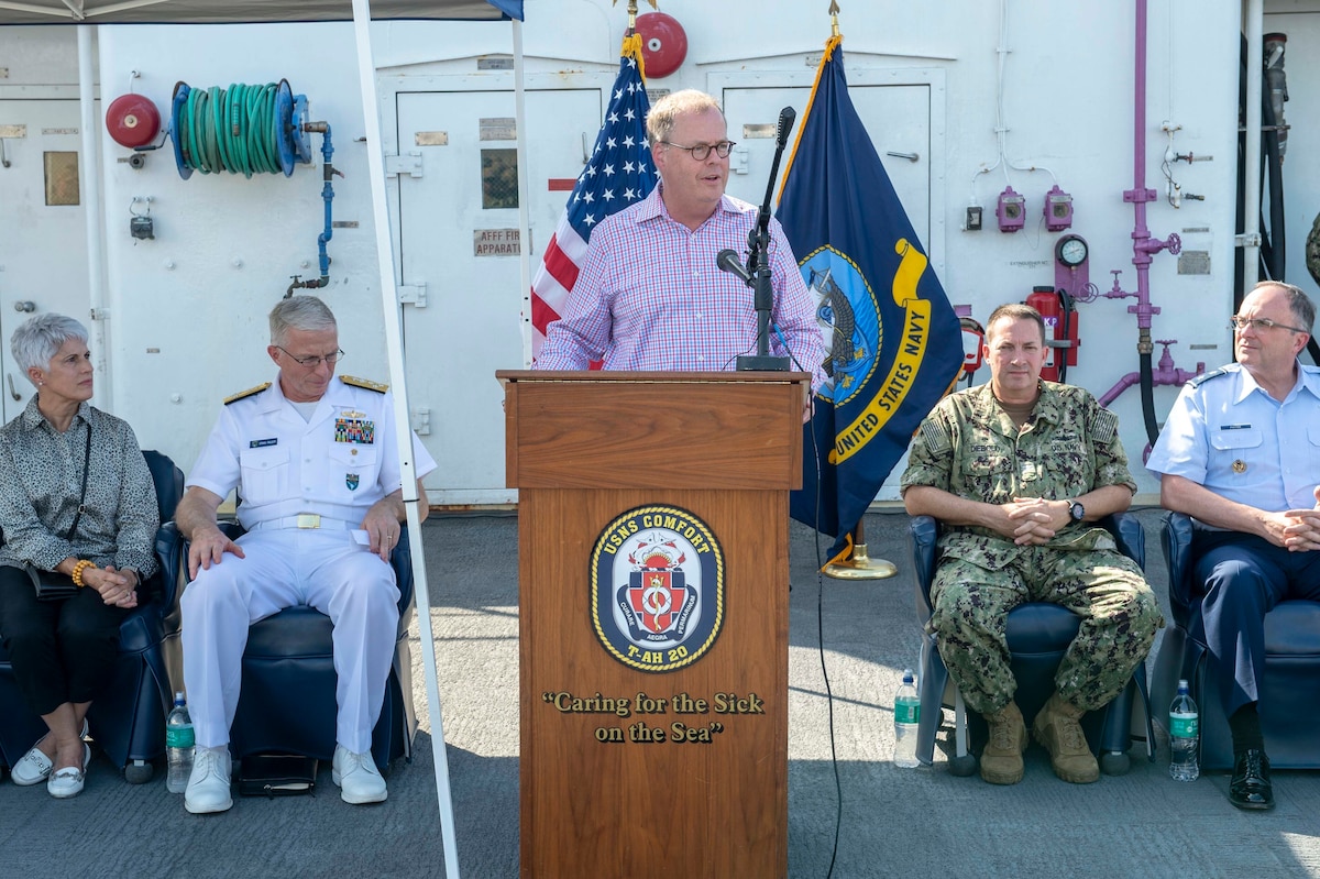 Tom McCaffery, assistant secretary of defense for health affairs, speaks during an all-hands call aboard the hospital ship USNS Comfort (T-AH 20) while the ship is anchored off the coast of Port-Au-Prince, Haiti, Nov. 7, 2019.